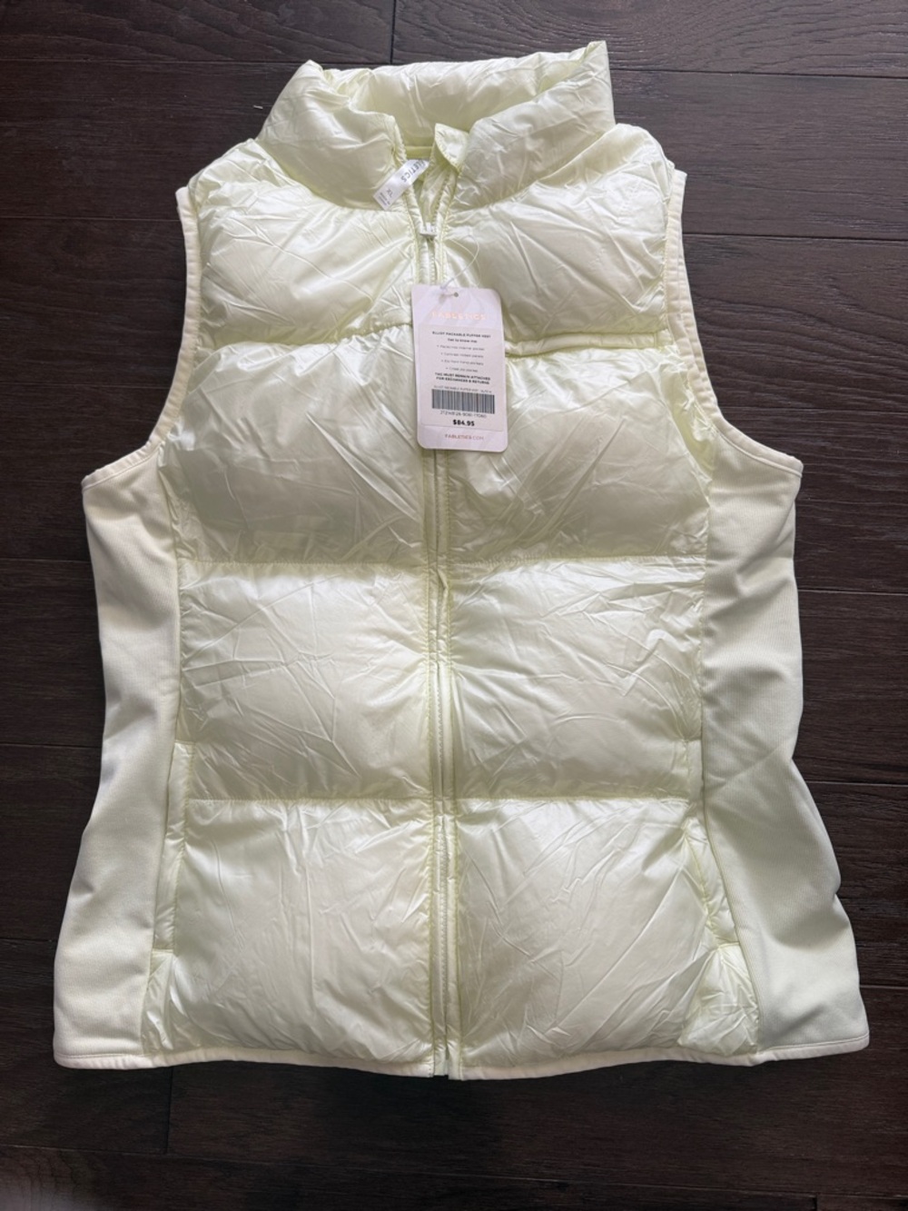 Fabletics Elliot Packable Puffer Vest in yellow/lime green